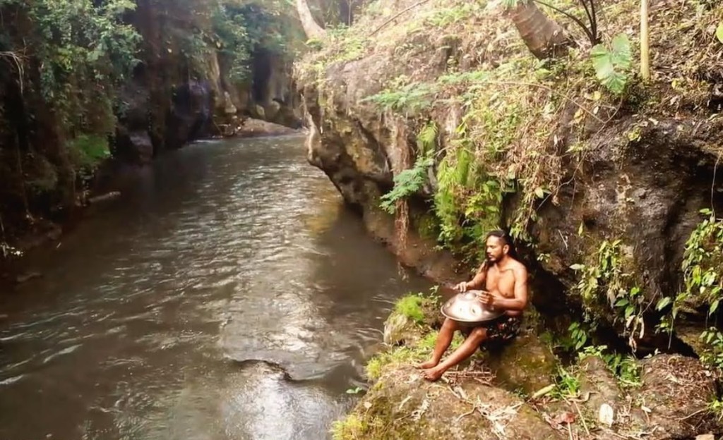 Merkaba handpan by a canyon river